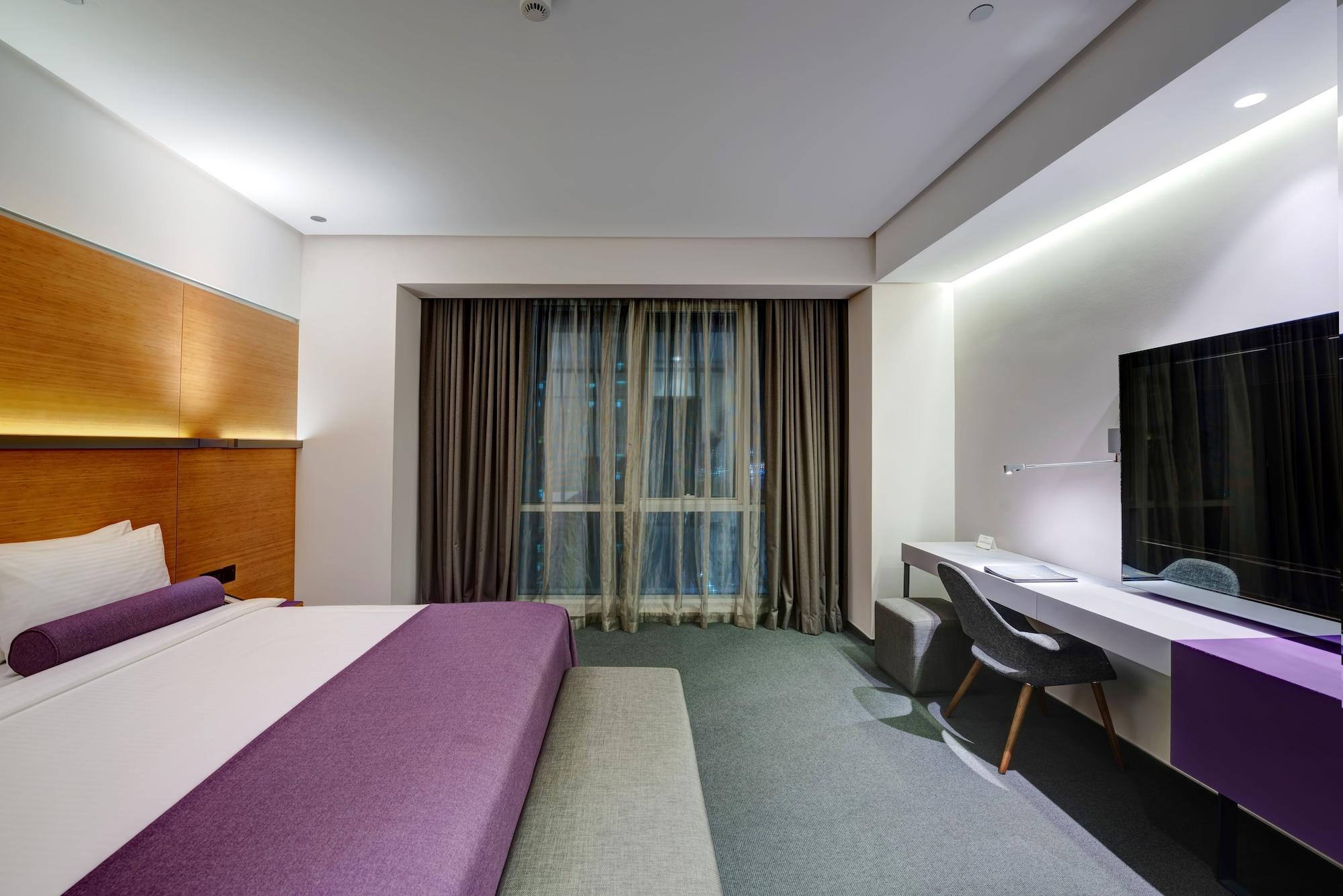 ザ アクト ホテル シャールジャ シャルジャ エクステリア 写真 A room at the hotel